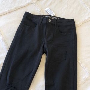 NWT - American Eagle black ripped skinny jeans